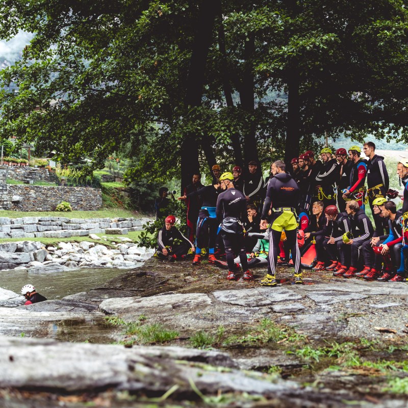 a group of people sitting at a park