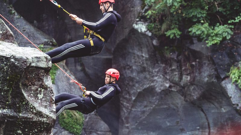 a man flying through the air while riding skis
